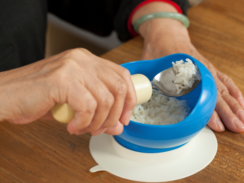 A scooper bowl with high edges at bowl to avoid spilling out the food.