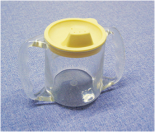 A mug with two handles and heavy base to drink water to alleviate hands tremor.